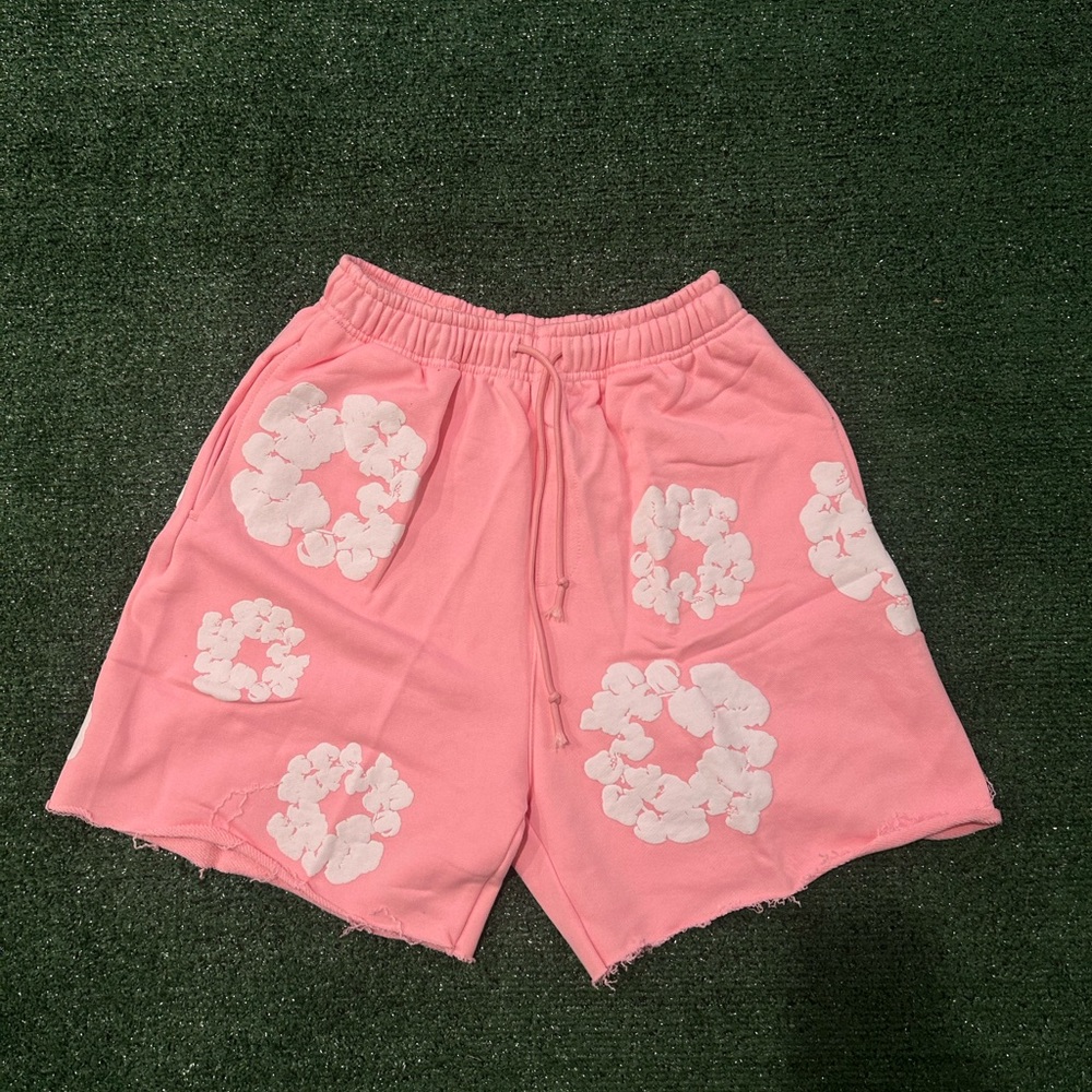 Pink denim tear shorts